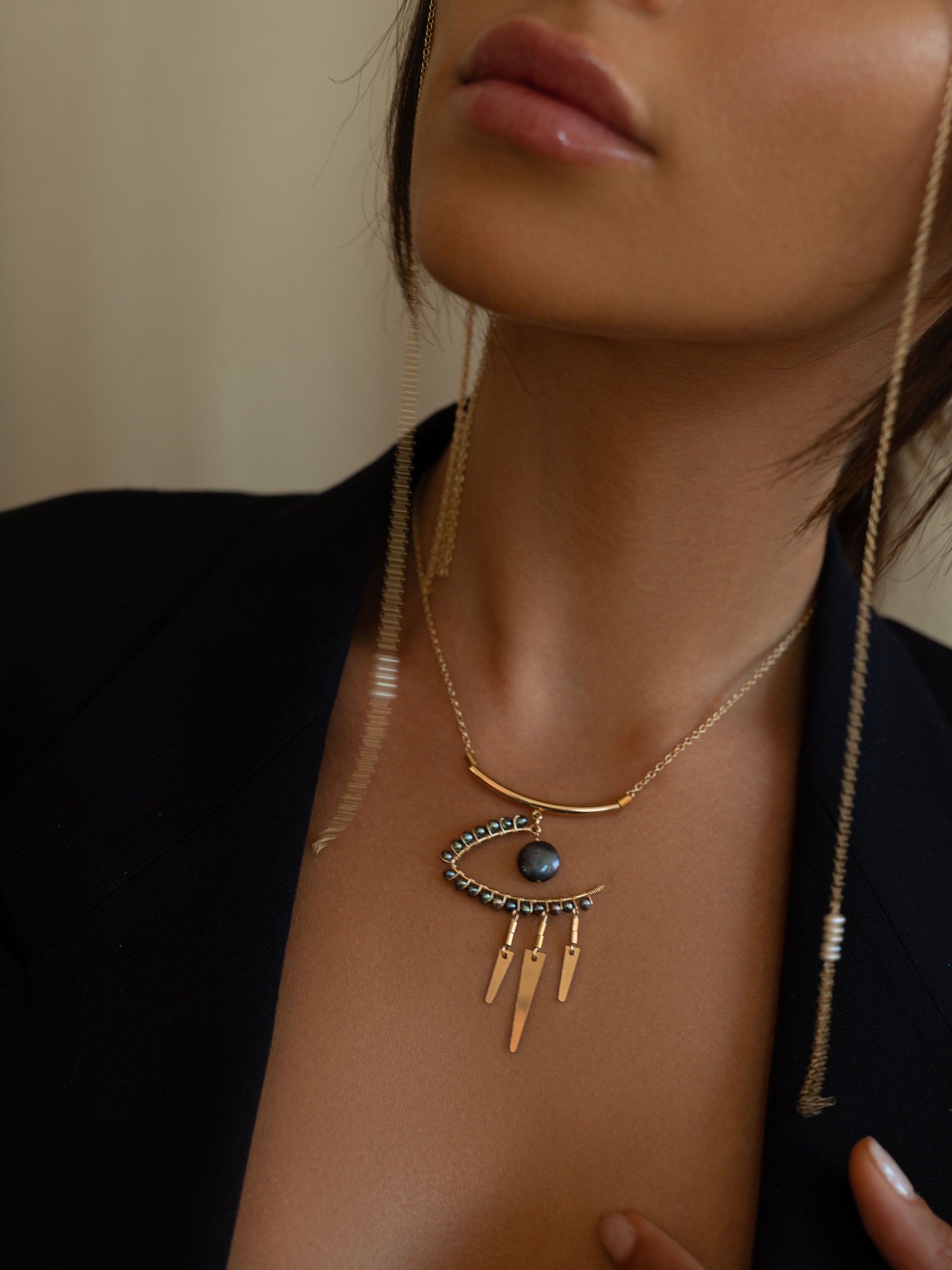 Eye of shops horus gold necklace